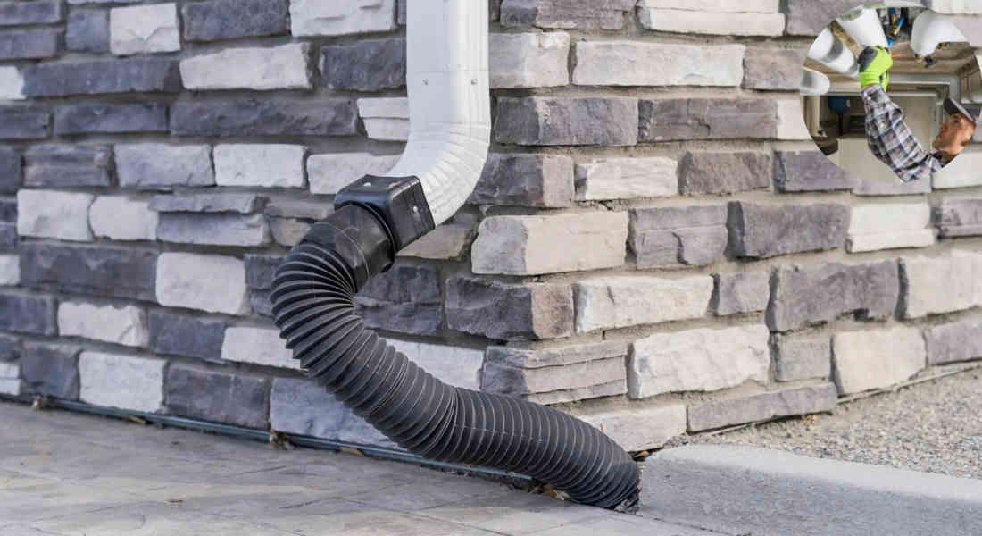 how to drain downspout water away from house